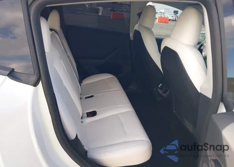 2023 Tesla Model Y Awd/Long Range Dual Motor All-Wheel Drive z USA, uszkodzony, nr VIN 7SAYGDEE0PA135579